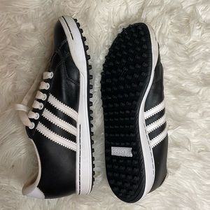 Black Adidas golf shoes (women’s)